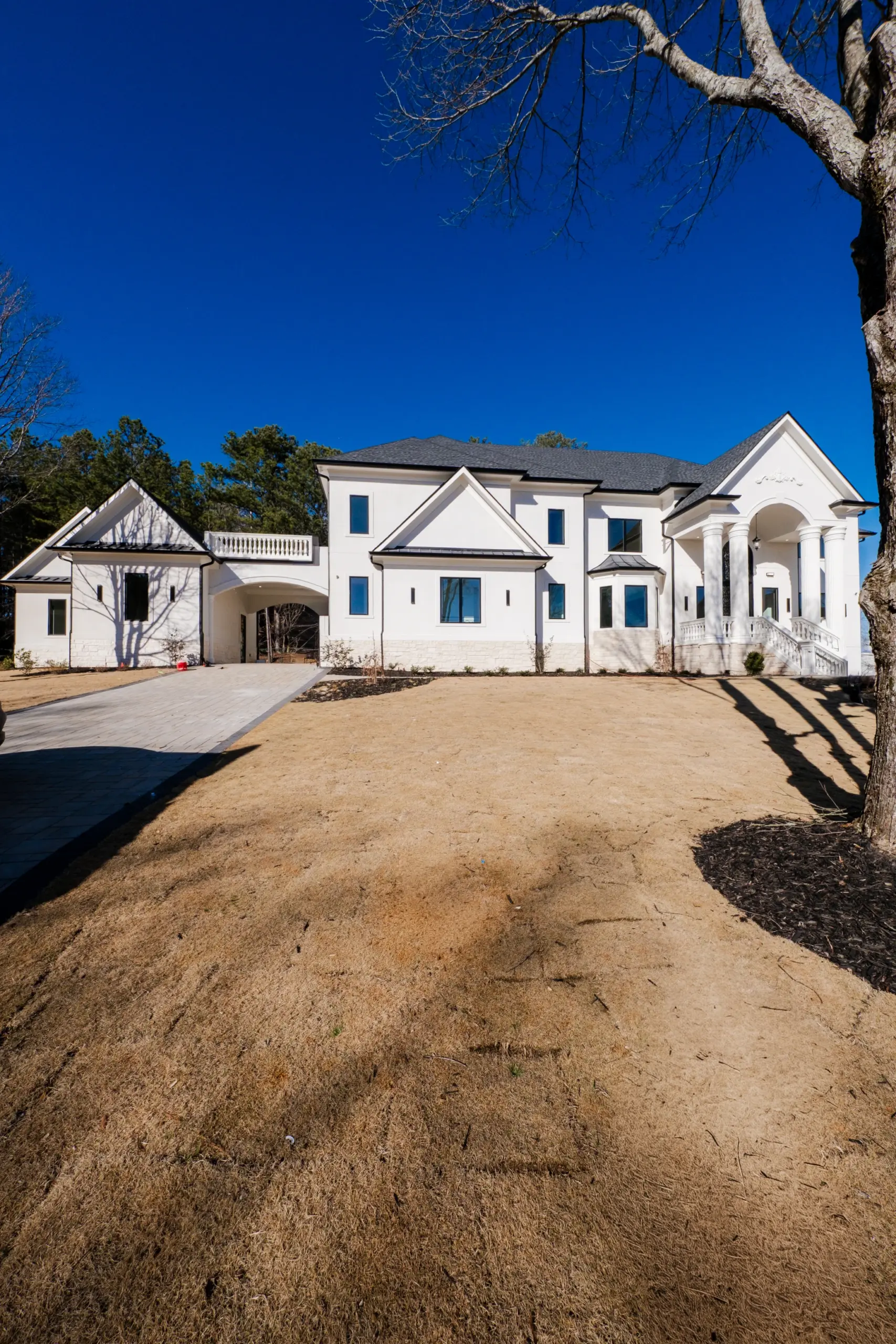 Modern Kitchen — White Cabinetry & Calacatta Marble Countertops