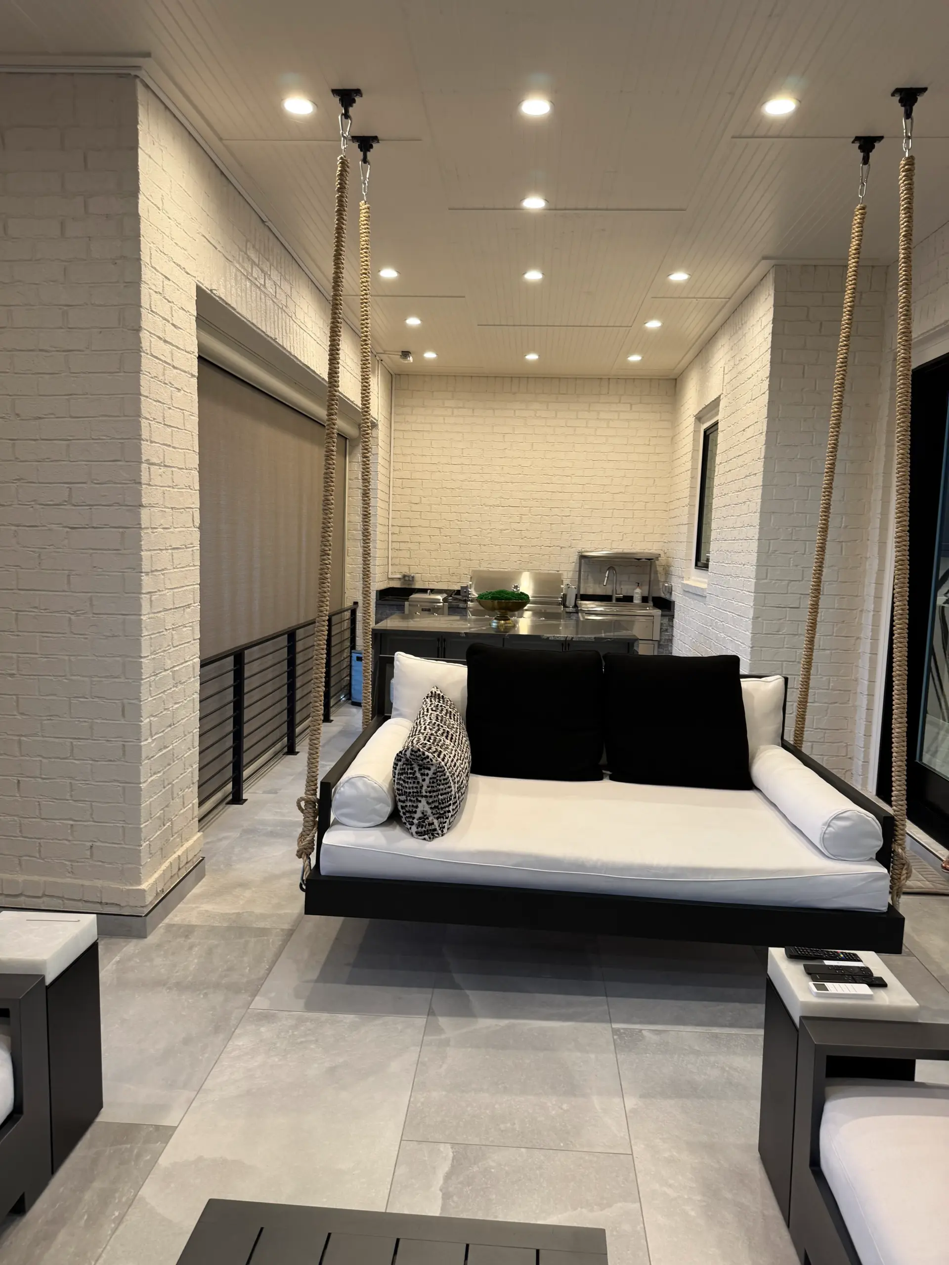 Luxury outdoor living space with covered pavilion and outdoor kitchen