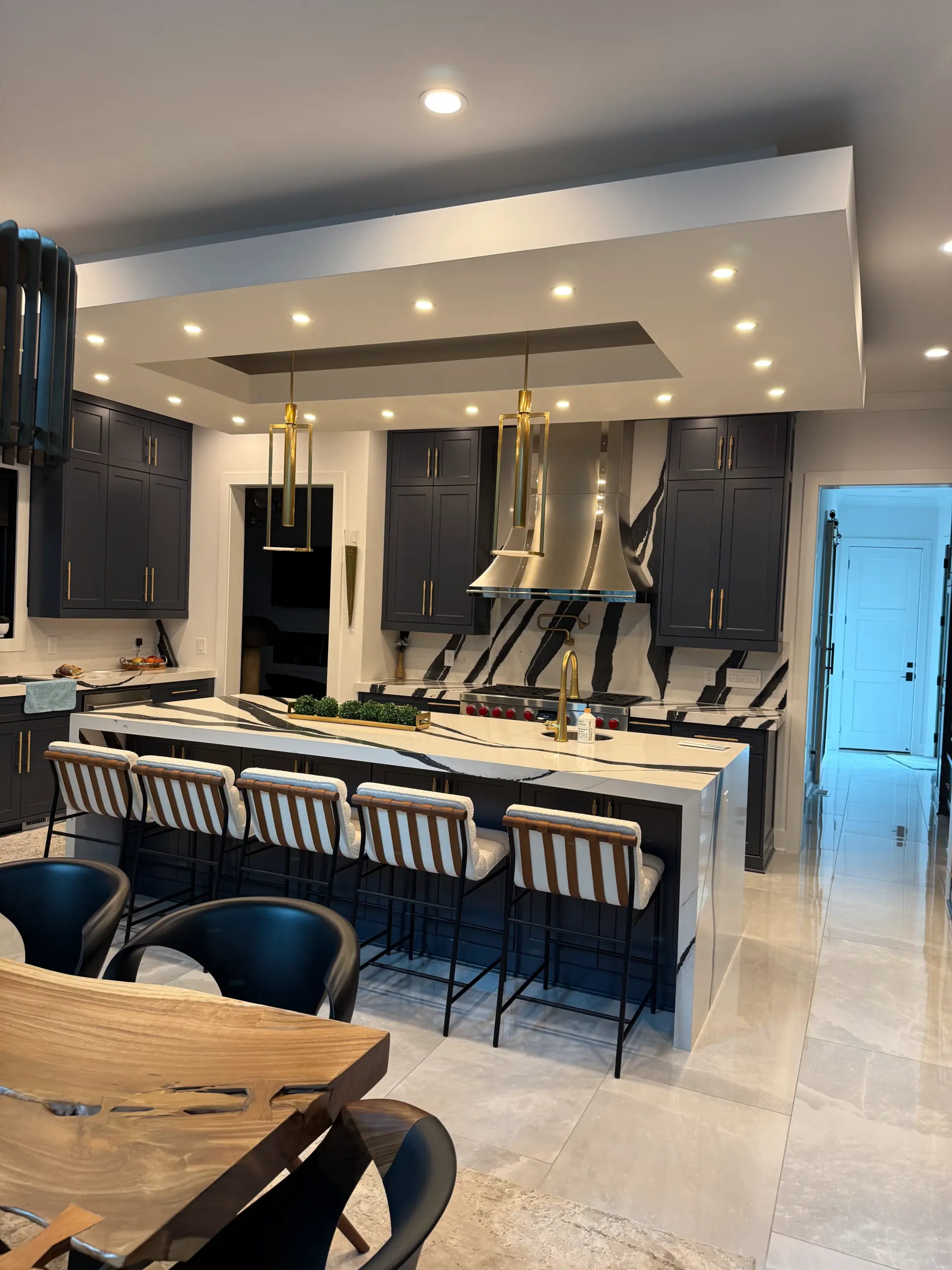 Gourmet Kitchen Design: Navy Cabinetry, Bold Marble and Professional Appliances